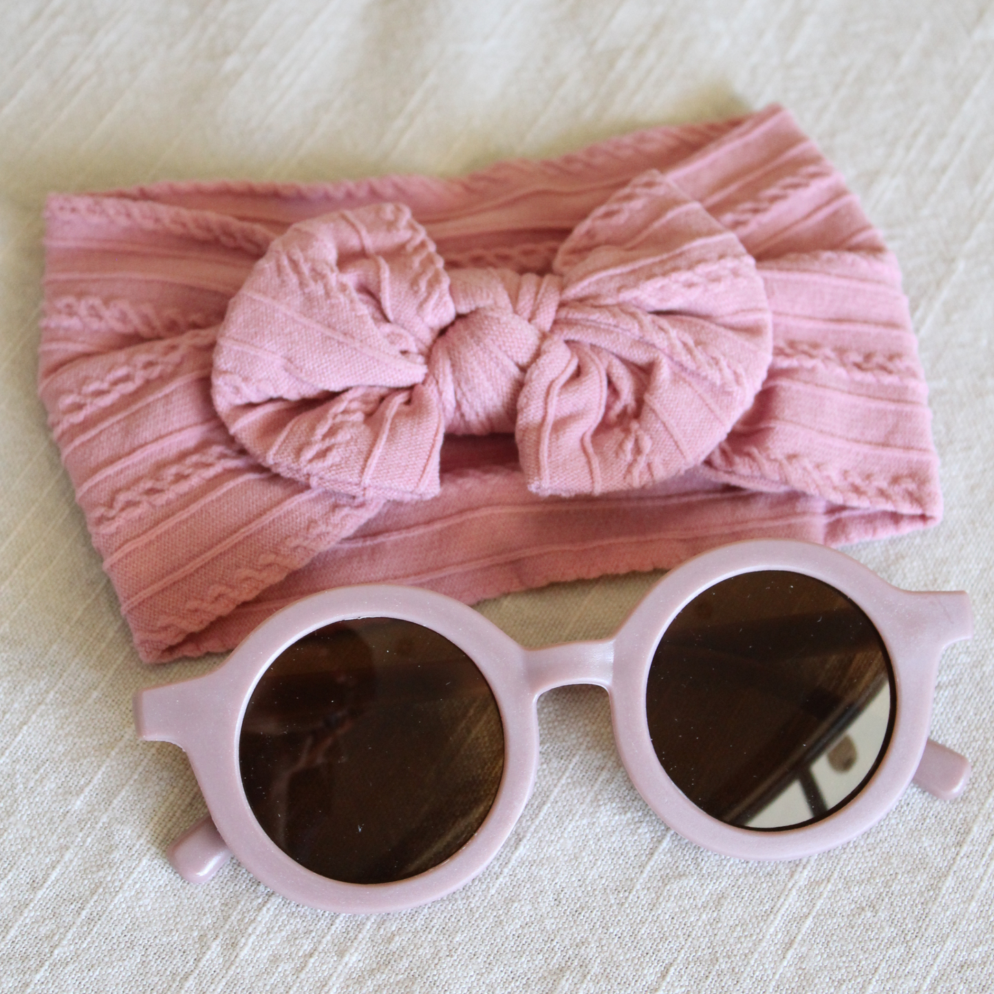 Set de diadema con lentes rosa